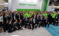 The Koh Young team celebrating teamwork and success at the 2019 IPC APEX Expo